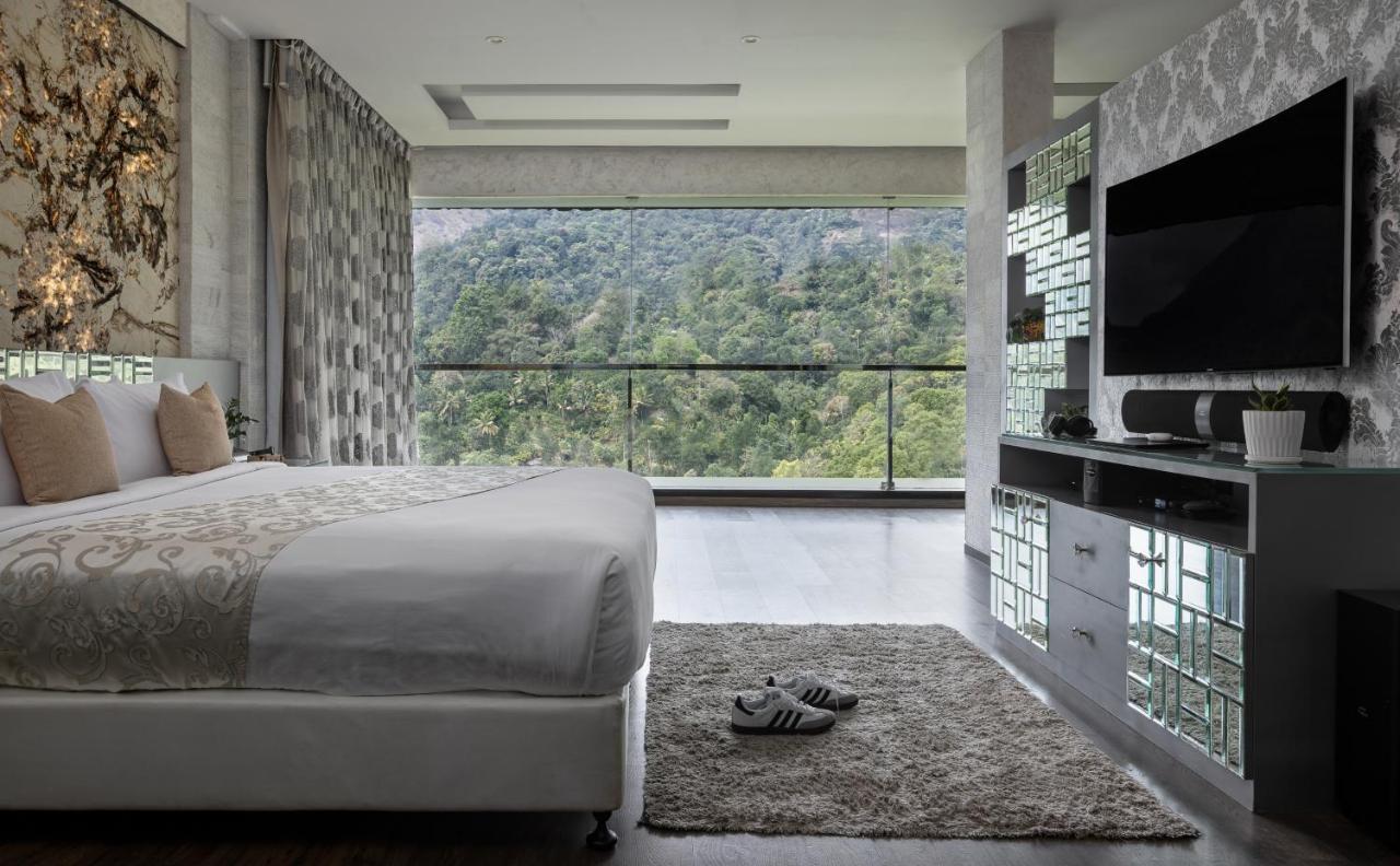 The Panoramic Getaway Hotel Munnar Ngoại thất bức ảnh A bedroom at the hotel