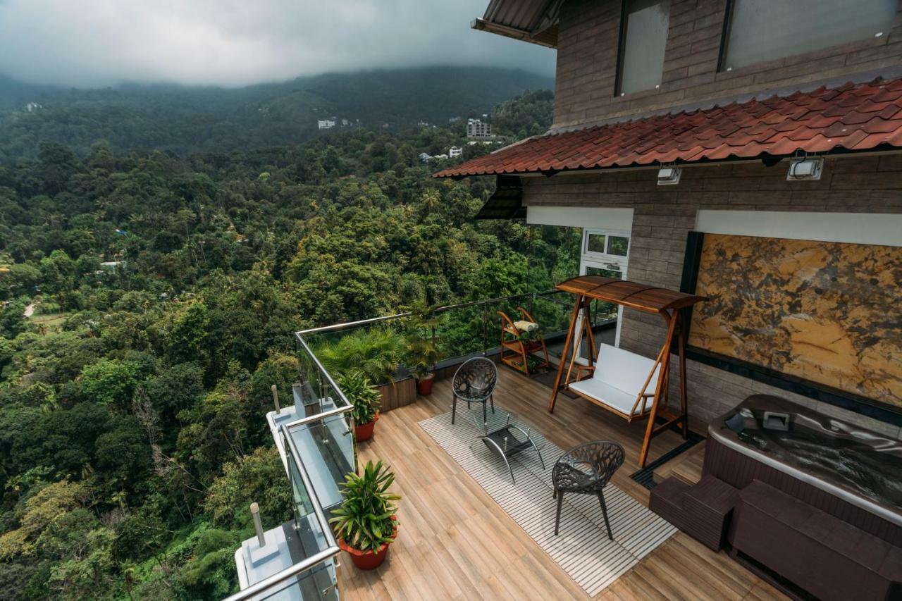 The Panoramic Getaway Hotel Munnar Ngoại thất bức ảnh A view from the balcony of a house in Kerala, India